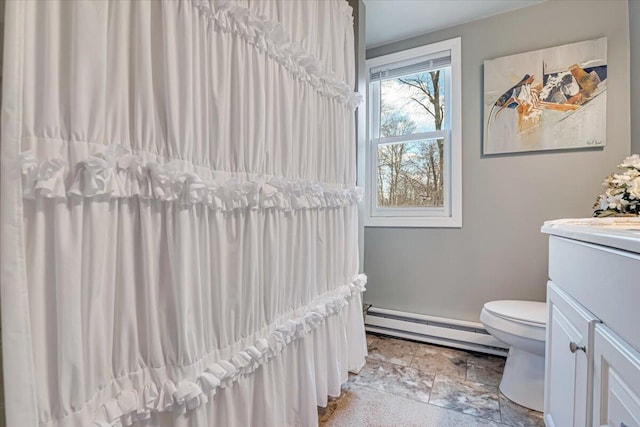 253 Thomas Rd, Blakeslee, PA 18610 - full bath with baseboard heating, vanity, toilet, and stone finish flooring