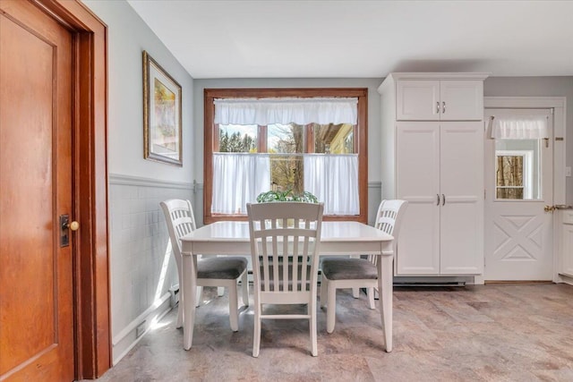 253 Thomas Rd, Blakeslee, PA 18610 - dining area with a wainscoted wall and tile walls