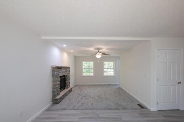 4105 Arbutus Dr Unit 1200, Tobyhanna, PA 18466 - living area with a stone fireplace, a ceiling fan, and recessed lighting