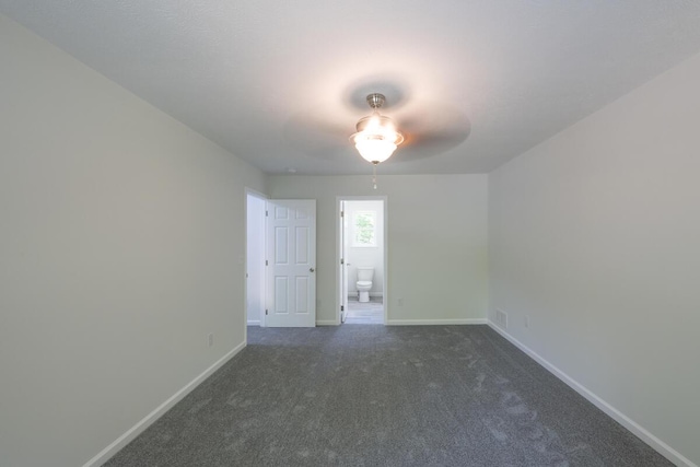 4105 Arbutus Dr Unit 1200, Tobyhanna, PA 18466 - spare room with a ceiling fan, baseboards, and dark carpet