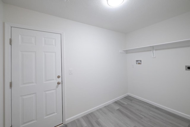 4105 Arbutus Dr Unit 1200, Tobyhanna, PA 18466 - laundry area featuring hookup for an electric dryer, hookup for a washing machine, light wood finished floors, and baseboards