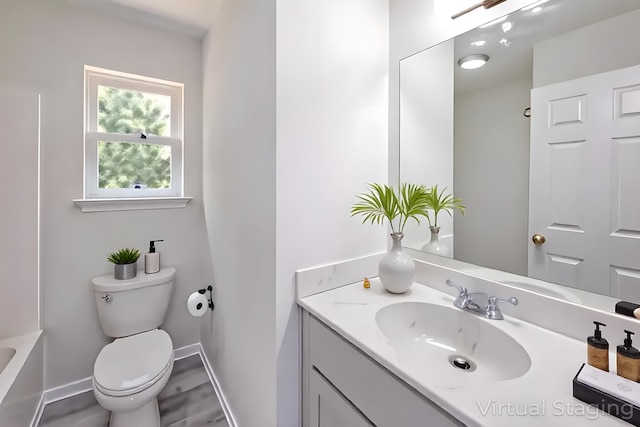 4105 Arbutus Dr Unit 1200, Tobyhanna, PA 18466 - bathroom featuring toilet, vanity, and baseboards