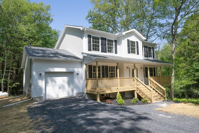 4105 Arbutus Dr Unit 1200, Tobyhanna, PA 18466 - view of front of house featuring a porch, an attached garage, and asphalt driveway