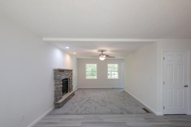 4105 Arbutus Dr Unit 1200, Tobyhanna, PA 18466 - unfurnished living room featuring a ceiling fan, a fireplace, baseboards, recessed lighting, and wood finished floors