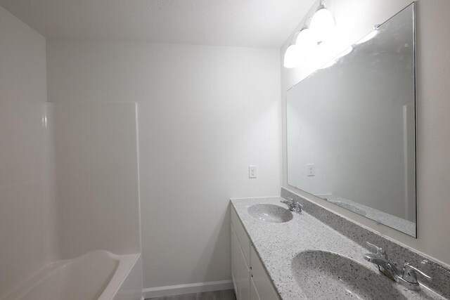 4105 Arbutus Dr Unit 1200, Tobyhanna, PA 18466 - bathroom with toilet,  shower combination, vanity, baseboards, and wood finished floors