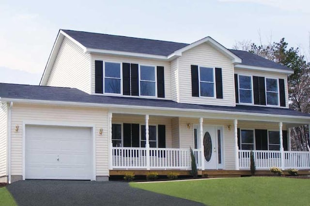 4105 Arbutus Dr Unit 1200, Tobyhanna, PA 18466 - view of front of home with a porch, a garage, and a front lawn
