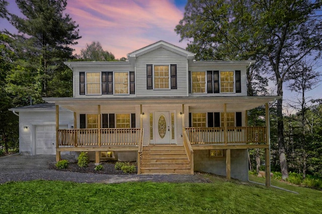 4105 Arbutus Dr Unit 1200, Tobyhanna, PA 18466 - view of front of property featuring a porch, an attached garage, a front lawn, and driveway