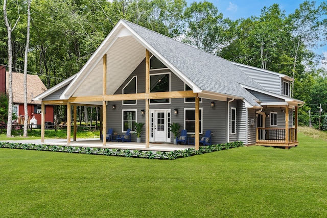21 Wilde Gln, Albrightsville, PA 18210 - rear view of house featuring roof with shingles, a yard, and a deck