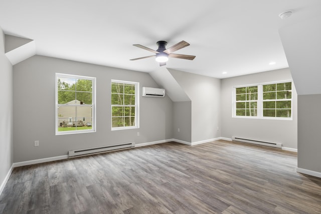21 Wilde Gln, Albrightsville, PA 18210 - additional living space with baseboard heating, a wall mounted AC, ceiling fan, healthy amount of natural light, and lofted ceiling