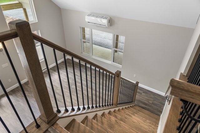 21 Wilde Gln, Albrightsville, PA 18210 - staircase featuring a wall mounted air conditioner and wood finished floors