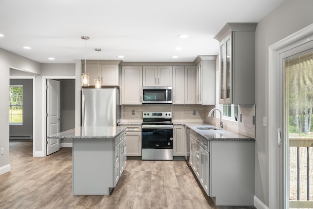 21 Wilde Gln, Albrightsville, PA 18210 - kitchen featuring appliances with stainless steel finishes, gray cabinets, a center island, light stone counters, and recessed lighting