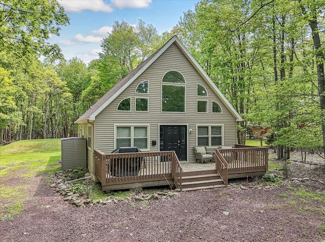 186 Brier Crest Rd, Blakeslee, PA 18610 - rear view of house featuring a wooden deck and a wooded view