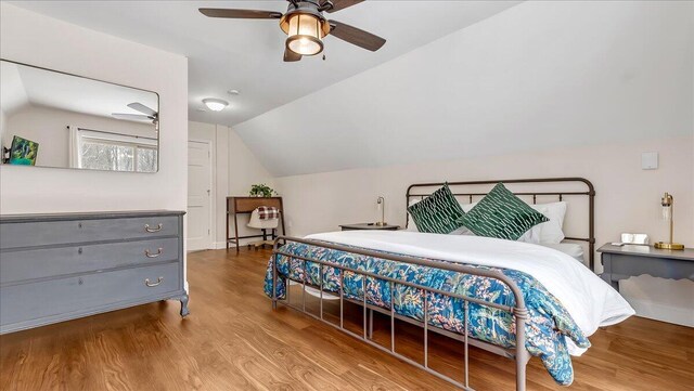 186 Brier Crest Rd, Blakeslee, PA 18610 - bedroom featuring lofted ceiling, wood finished floors, and ceiling fan