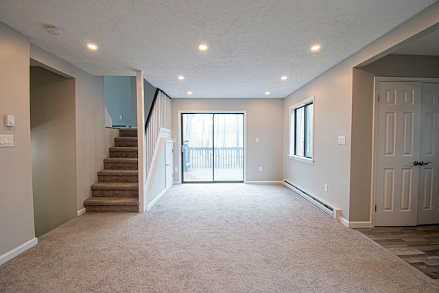 unfurnished living room with recessed lighting, carpet, baseboards, a baseboard radiator, and stairs