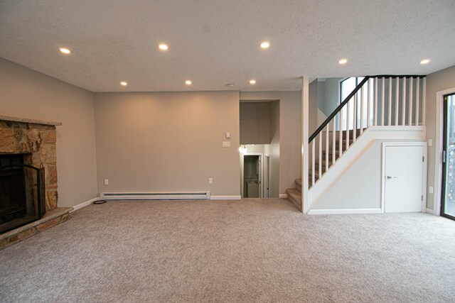 unfurnished living room featuring a baseboard heating unit, carpet, stairway, and recessed lighting