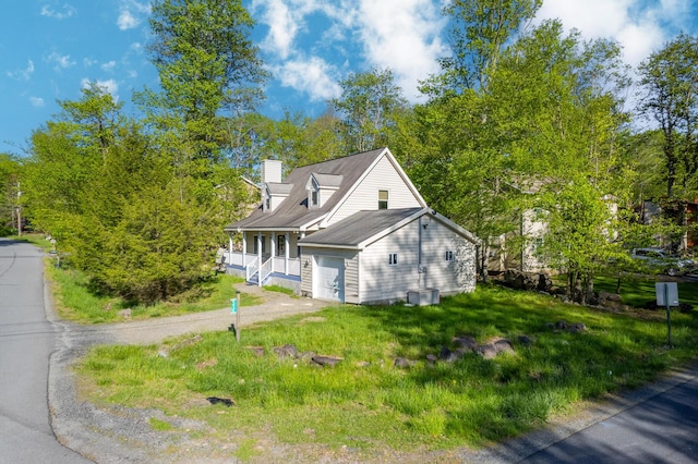 6435 Marvin Gdns, Tobyhanna, PA 18466 - new england style home with a porch, a chimney, and a front lawn