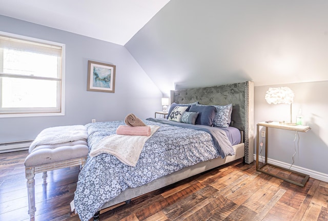 6435 Marvin Gdns, Tobyhanna, PA 18466 - bedroom with lofted ceiling, baseboards, wood finished floors, and baseboard heating