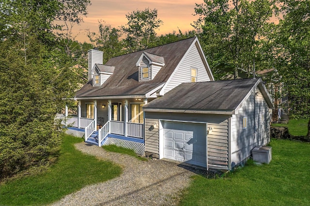 6435 Marvin Gdns, Tobyhanna, PA 18466 - new england style home featuring a porch, a chimney, driveway, a yard, and a garage