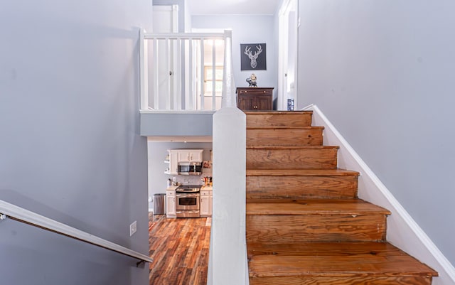 6435 Marvin Gdns, Tobyhanna, PA 18466 - staircase with wood finished floors