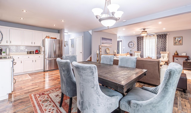 6435 Marvin Gdns, Tobyhanna, PA 18466 - dining space featuring recessed lighting, light wood finished floors, a ceiling fan, and a chandelier