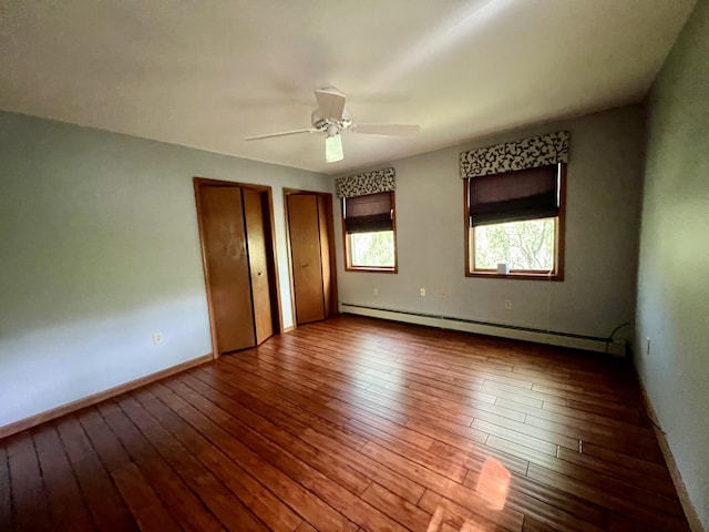 125 Ponder Ln, Scotrun, PA 18355 - spare room featuring a baseboard heating unit, hardwood / wood-style floors, ceiling fan, and baseboards