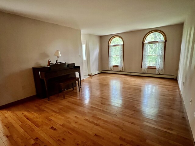 125 Ponder Ln, Scotrun, PA 18355 - living area with baseboard heating and wood finished floors