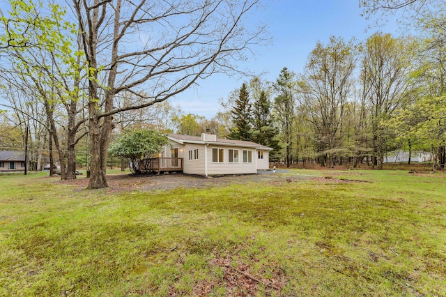19 Mckinley Ln, Albrightsville, PA 18210 - view of green lawn with a wooden deck