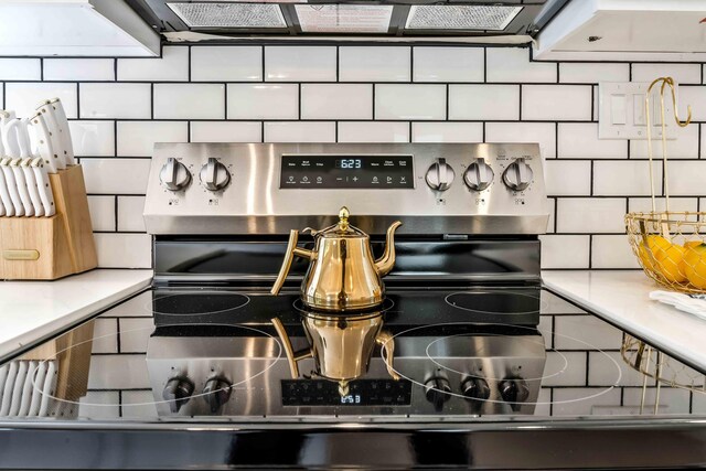 19 Mckinley Ln, Albrightsville, PA 18210 - kitchen view of electric range, tasteful backsplash, and light countertops