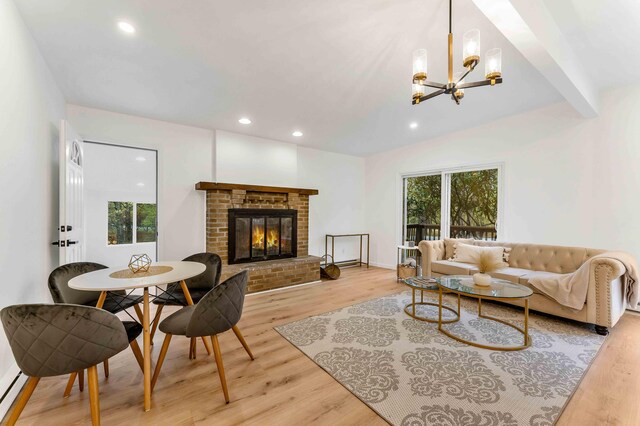 19 Mckinley Ln, Albrightsville, PA 18210 - living area with a fireplace, light wood-style flooring, a chandelier, and recessed lighting
