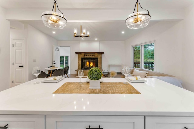 19 Mckinley Ln, Albrightsville, PA 18210 - kitchen featuring lofted ceiling, open floor plan, white cabinetry, decorative light fixtures, and recessed lighting
