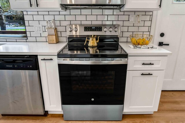 19 Mckinley Ln, Albrightsville, PA 18210 - kitchen with stainless steel appliances, light countertops, and white cabinetry