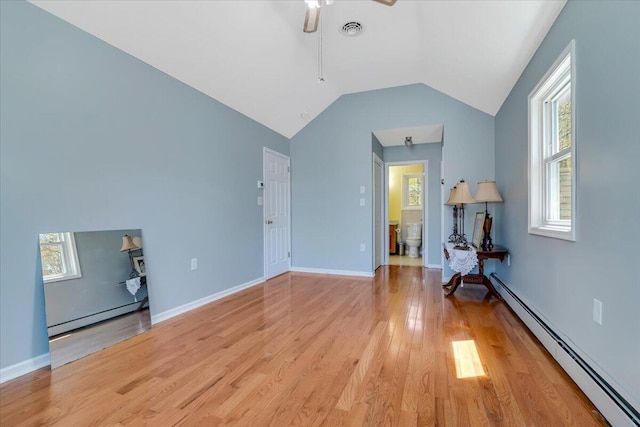 190 Reunion Rdg, East Stroudsburg, PA 18301 - interior space featuring baseboard heating, a ceiling fan, light wood-type flooring, and visible vents
