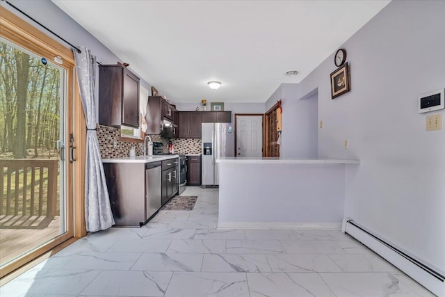 190 Reunion Rdg, East Stroudsburg, PA 18301 - kitchen featuring dark brown cabinets, appliances with stainless steel finishes, baseboard heating, light countertops, and marble finish floor