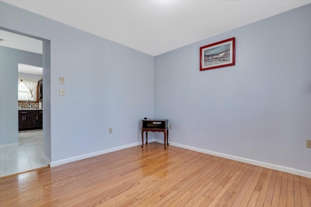 190 Reunion Rdg, East Stroudsburg, PA 18301 - empty room with a sink, baseboards, and light wood-type flooring