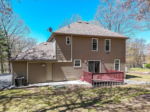 190 Reunion Rdg, East Stroudsburg, PA 18301 - back of property with a lawn, a wooden deck, central AC, a patio, and a shingled roof