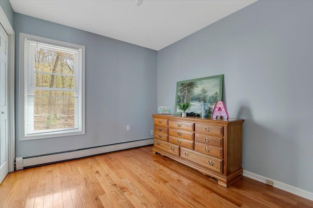 190 Reunion Rdg, East Stroudsburg, PA 18301 - bedroom with baseboards, baseboard heating, and light wood-style flooring