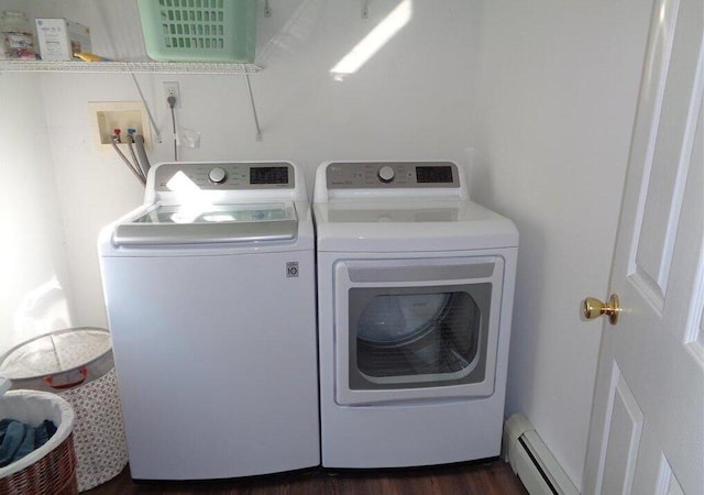 144 Dogwood Dr, Jim Thorpe, PA 18229 - laundry area with washing machine and dryer, a baseboard radiator, and dark wood-style floors