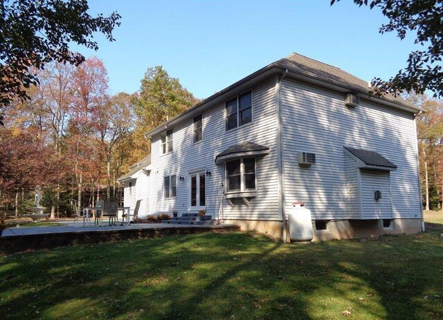 144 Dogwood Dr, Jim Thorpe, PA 18229 - back of house featuring a yard, a patio area, and entry steps