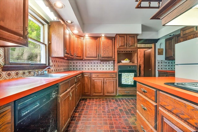 1163 Bush Rd, Cresco, PA 18326 - kitchen with black appliances, a sink, decorative backsplash, light countertops, and recessed lighting