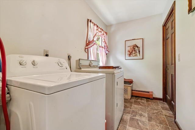 1163 Bush Rd, Cresco, PA 18326 - laundry room featuring baseboard heating, washing machine and clothes dryer, baseboards, and stone finish floors
