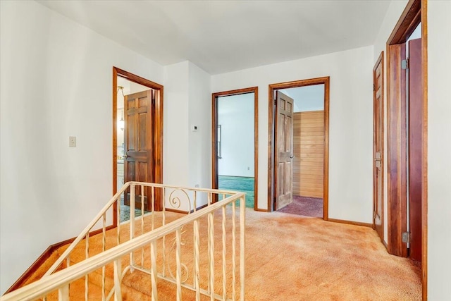 1163 Bush Rd, Cresco, PA 18326 - corridor featuring light carpet, baseboards, and an upstairs landing