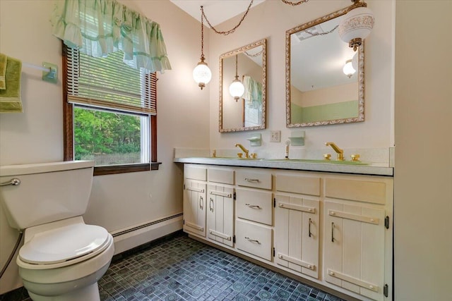 1163 Bush Rd, Cresco, PA 18326 - full bathroom with a baseboard heating unit, toilet, double vanity, and baseboards