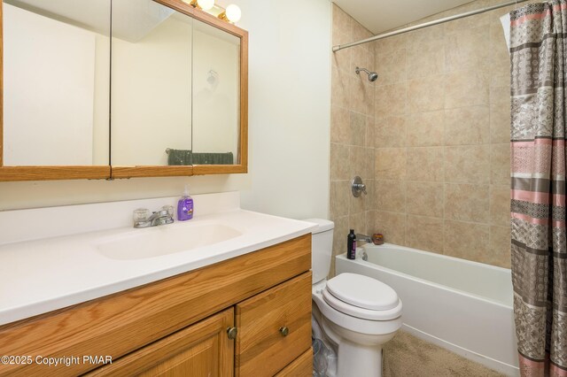 full bathroom featuring vanity, shower / bath combination with curtain, and toilet