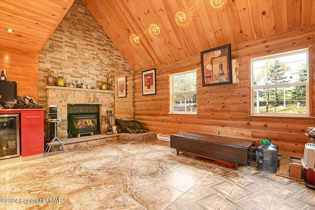 living room with high vaulted ceiling, wine cooler, wooden ceiling, and plenty of natural light