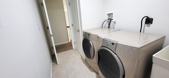 259 Great Bear Way E, Stroudsburg, PA 18302 - washroom with washing machine and clothes dryer and light tile patterned floors
