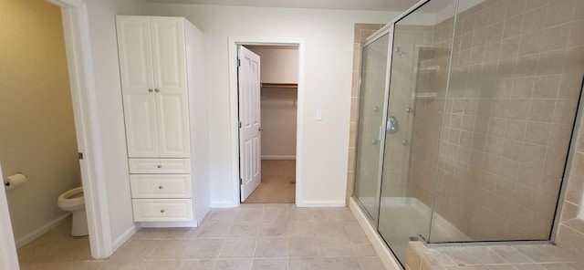 259 Great Bear Way E, Stroudsburg, PA 18302 - bathroom featuring a shower stall, tile patterned flooring, and a spacious closet