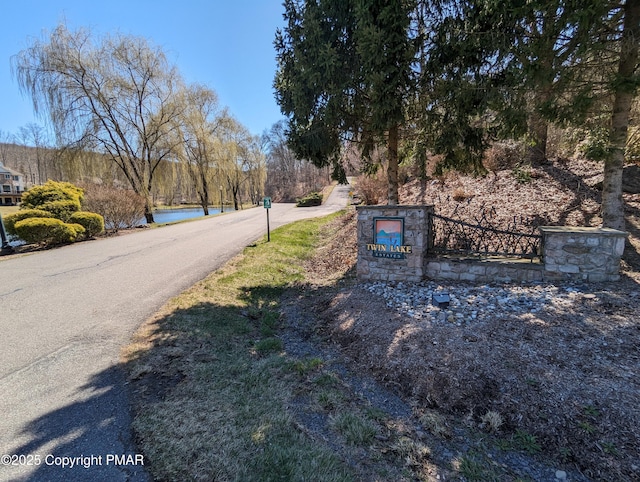 411 Pierce Ln, East Stroudsburg, PA 18301 - view of asphalt road featuring a water view