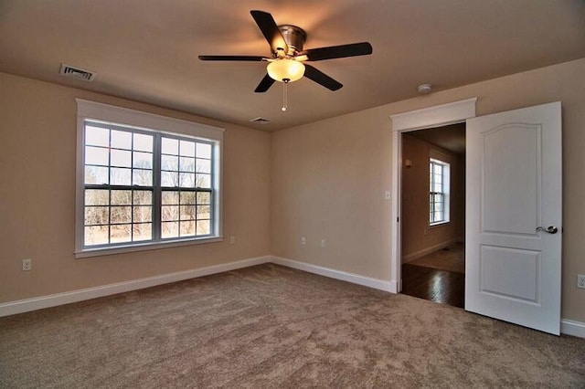 411 Pierce Ln, East Stroudsburg, PA 18301 - carpeted empty room with ceiling fan, baseboards, and a smoke detector