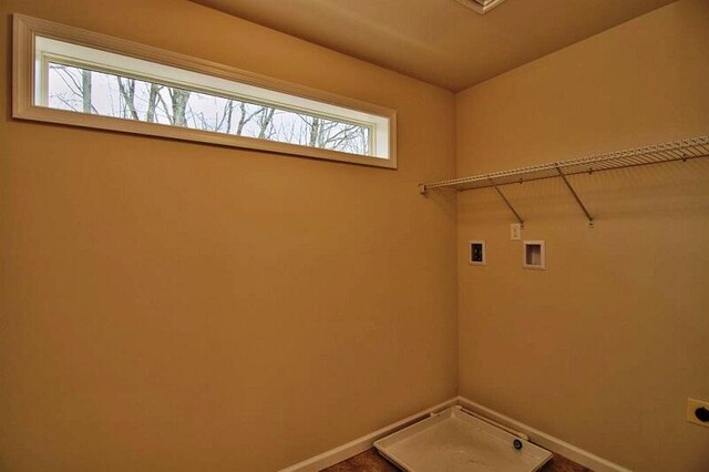 411 Pierce Ln, East Stroudsburg, PA 18301 - laundry area with baseboards and hookup for an electric dryer