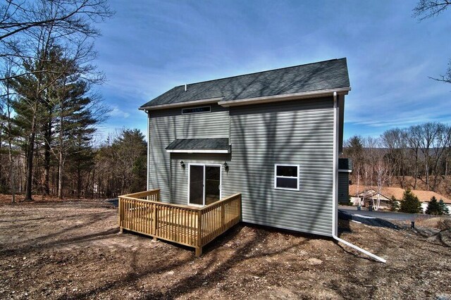 411 Pierce Ln, East Stroudsburg, PA 18301 - rear view of house featuring a deck and a shingled roof